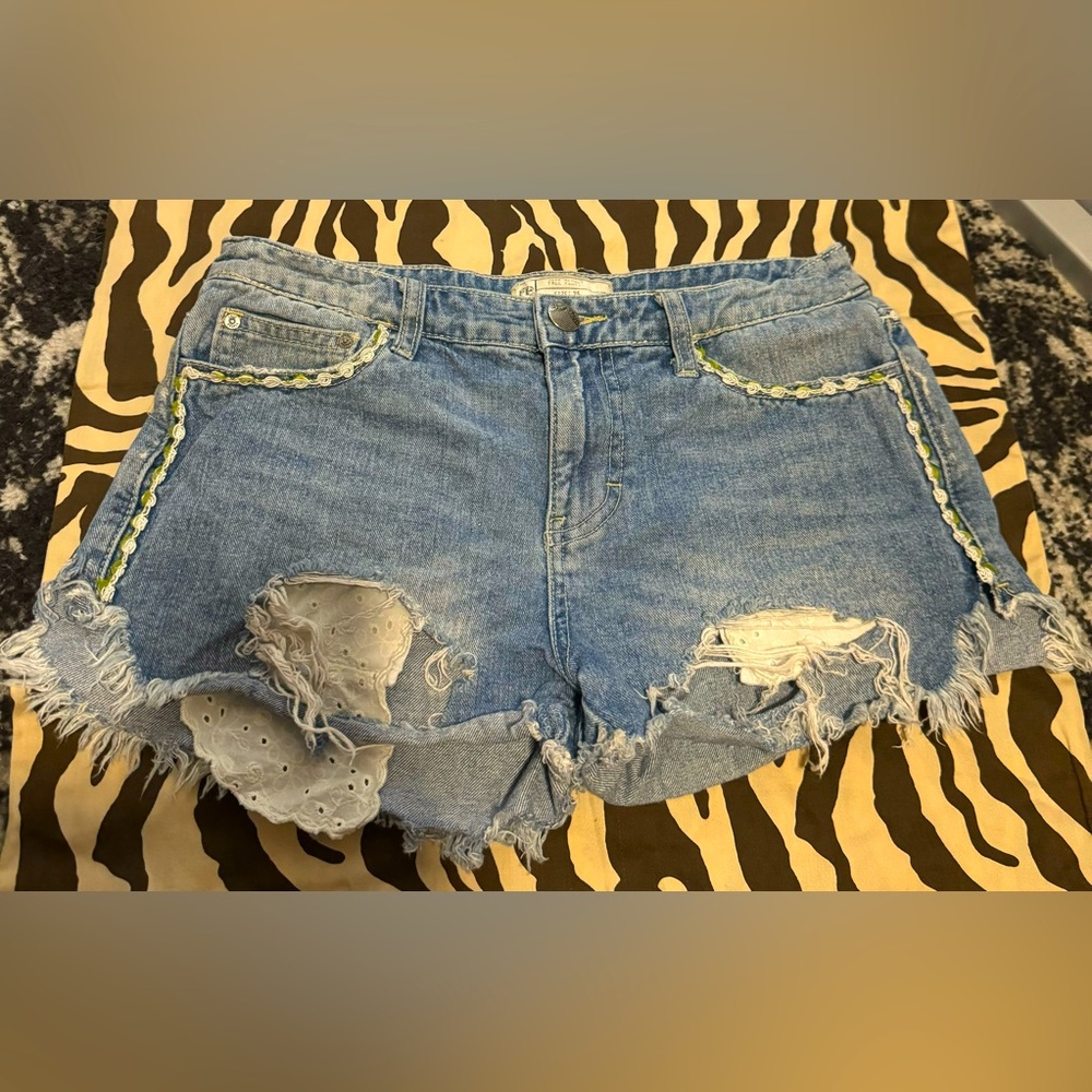 Free People Size 25 distressed shorts.